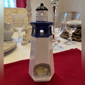 Ceramic Lighthouse Candle Hokder, 8” H. No chips or cracks.